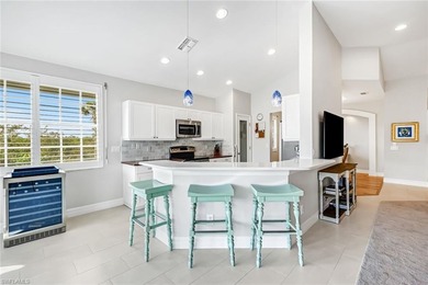 Light-filled and beautifully appointed, this top-floor on Bonita Bay West in Florida - for sale on GolfHomes.com, golf home, golf lot