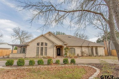 This beautifully updated home strikes that perfect balance on Hide-A-Way Lake Golf Course in Texas - for sale on GolfHomes.com, golf home, golf lot