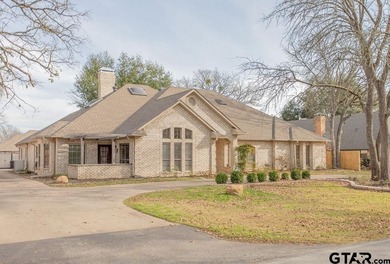 This beautifully updated home strikes that perfect balance on Hide-A-Way Lake Golf Course in Texas - for sale on GolfHomes.com, golf home, golf lot