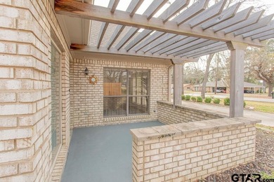 This beautifully updated home strikes that perfect balance on Hide-A-Way Lake Golf Course in Texas - for sale on GolfHomes.com, golf home, golf lot