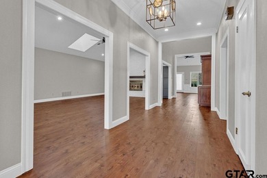 This beautifully updated home strikes that perfect balance on Hide-A-Way Lake Golf Course in Texas - for sale on GolfHomes.com, golf home, golf lot