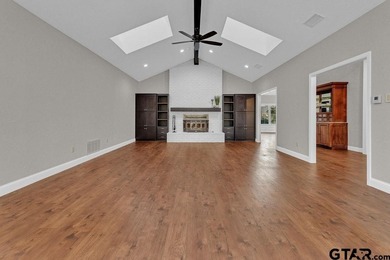 This beautifully updated home strikes that perfect balance on Hide-A-Way Lake Golf Course in Texas - for sale on GolfHomes.com, golf home, golf lot