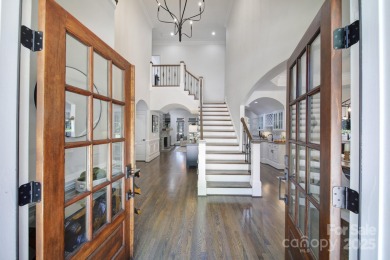 Ideally situated on a picturesque 1-acre lot in Lake Norman's on Trump National Golf Club Charlotte in North Carolina - for sale on GolfHomes.com, golf home, golf lot