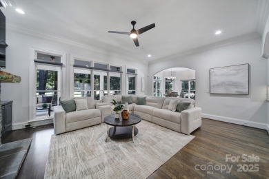 Ideally situated on a picturesque 1-acre lot in Lake Norman's on Trump National Golf Club Charlotte in North Carolina - for sale on GolfHomes.com, golf home, golf lot