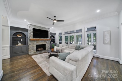 Ideally situated on a picturesque 1-acre lot in Lake Norman's on Trump National Golf Club Charlotte in North Carolina - for sale on GolfHomes.com, golf home, golf lot