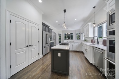 Ideally situated on a picturesque 1-acre lot in Lake Norman's on Trump National Golf Club Charlotte in North Carolina - for sale on GolfHomes.com, golf home, golf lot