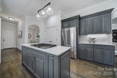 Ideally situated on a picturesque 1-acre lot in Lake Norman's on Trump National Golf Club Charlotte in North Carolina - for sale on GolfHomes.com, golf home, golf lot