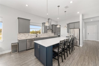 Step inside to enjoy this beautiful 3-bedroom, 2-bathroom home on Stone Creek Golf Club in Florida - for sale on GolfHomes.com, golf home, golf lot