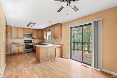 This inviting 3-bedroom, 2.5-bath home offers rare privacy with on Brooktrails Golf Course in California - for sale on GolfHomes.com, golf home, golf lot