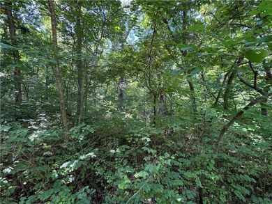 Explore the potential of four scenic lots located on a quiet on Sugar Valley Lakes Golf Course in Kansas - for sale on GolfHomes.com, golf home, golf lot