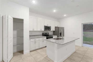 Discover effortless living in this brand-new 4-bedroom, 2-bath on Citrus Springs Country Club in Florida - for sale on GolfHomes.com, golf home, golf lot