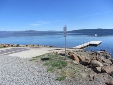 This property is .90 acres sloping towards beautiful Goose bay on Lake Almanor West Golf Course in California - for sale on GolfHomes.com, golf home, golf lot