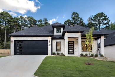 Quality construction, beautiful contemporary fixtures throughout on Chenal Country Club - Bear Den Mountain in Arkansas - for sale on GolfHomes.com, golf home, golf lot