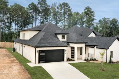 Quality construction, beautiful contemporary fixtures throughout on Chenal Country Club - Bear Den Mountain in Arkansas - for sale on GolfHomes.com, golf home, golf lot