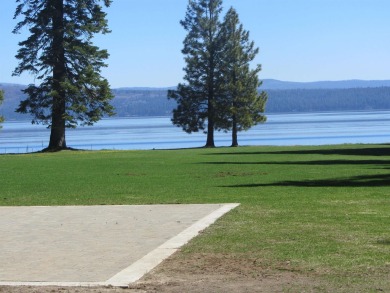 This property is .90 acres sloping towards beautiful Goose bay on Lake Almanor West Golf Course in California - for sale on GolfHomes.com, golf home, golf lot