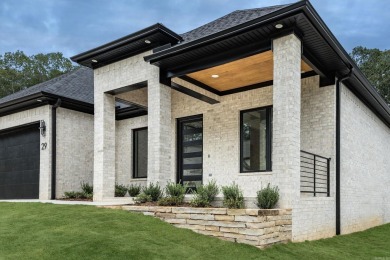 Quality construction, beautiful contemporary fixtures throughout on Chenal Country Club - Bear Den Mountain in Arkansas - for sale on GolfHomes.com, golf home, golf lot