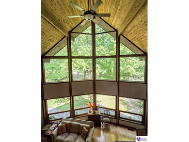 Welcome back to this exceptional Lindal Cedar Home, masterfully on Doe Valley Country Club in Kentucky - for sale on GolfHomes.com, golf home, golf lot