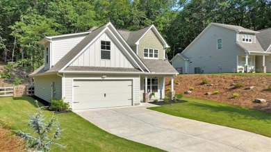 Discover the charm of this nearly new 2023 craftsman-style home on The Highlands Course at Lake Arrowhead in Georgia - for sale on GolfHomes.com, golf home, golf lot