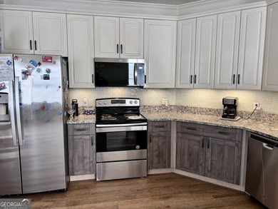 Welcome to this beautifully maintained 3-bedroom, 2-bathroom on Braelinn Golf Club in Georgia - for sale on GolfHomes.com, golf home, golf lot