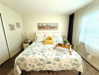 Enjoy the Florida lifestyle in this sunny and upgraded condo on Largo Golf Course in Florida - for sale on GolfHomes.com, golf home, golf lot