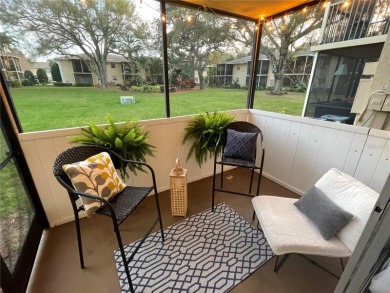 Enjoy the Florida lifestyle in this sunny and upgraded condo on Largo Golf Course in Florida - for sale on GolfHomes.com, golf home, golf lot