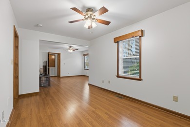 Exceptional Waterfront Retreat in beautiful Lake Royale! This on River Golf and Country Club at Lake Royale in North Carolina - for sale on GolfHomes.com, golf home, golf lot