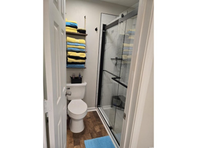 This fully furnished turnkey condo in the Spinnaker Cove section on The Valley At Eastport in South Carolina - for sale on GolfHomes.com, golf home, golf lot