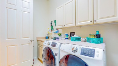 Welcome to this beautiful home located in the highly desirable on The Legacy Golf and Tennis Club in Florida - for sale on GolfHomes.com, golf home, golf lot