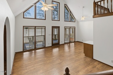 Exceptional Waterfront Retreat in beautiful Lake Royale! This on River Golf and Country Club at Lake Royale in North Carolina - for sale on GolfHomes.com, golf home, golf lot