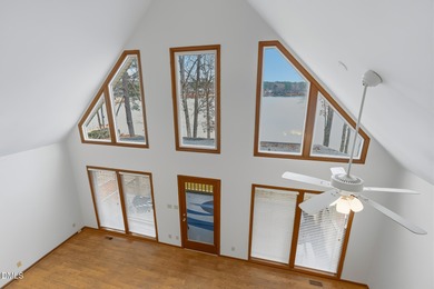 Exceptional Waterfront Retreat in beautiful Lake Royale! This on River Golf and Country Club at Lake Royale in North Carolina - for sale on GolfHomes.com, golf home, golf lot