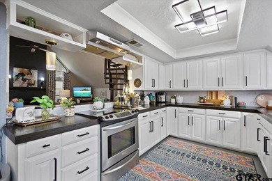 Welcome to this wonderful 3 bedroom, 2.5 bath home located on on Hide-A-Way Lake Golf Course in Texas - for sale on GolfHomes.com, golf home, golf lot