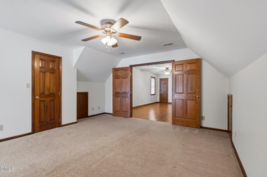 Exceptional Waterfront Retreat in beautiful Lake Royale! This on River Golf and Country Club at Lake Royale in North Carolina - for sale on GolfHomes.com, golf home, golf lot