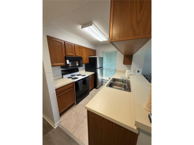 Furnished turn key 2/2  condo in PGA National. Low Hoa Fee on PGA National Golf Club in Florida - for sale on GolfHomes.com, golf home, golf lot