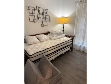 Furnished turn key 2/2  condo in PGA National. Low Hoa Fee on PGA National Golf Club in Florida - for sale on GolfHomes.com, golf home, golf lot