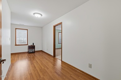 Exceptional Waterfront Retreat in beautiful Lake Royale! This on River Golf and Country Club at Lake Royale in North Carolina - for sale on GolfHomes.com, golf home, golf lot