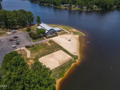 Exceptional Waterfront Retreat in beautiful Lake Royale! This on River Golf and Country Club at Lake Royale in North Carolina - for sale on GolfHomes.com, golf home, golf lot