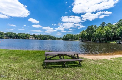 Exceptional Waterfront Retreat in beautiful Lake Royale! This on River Golf and Country Club at Lake Royale in North Carolina - for sale on GolfHomes.com, golf home, golf lot