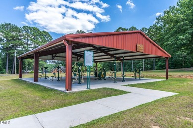 Exceptional Waterfront Retreat in beautiful Lake Royale! This on River Golf and Country Club at Lake Royale in North Carolina - for sale on GolfHomes.com, golf home, golf lot