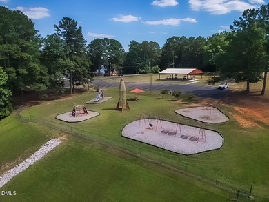 Exceptional Waterfront Retreat in beautiful Lake Royale! This on River Golf and Country Club at Lake Royale in North Carolina - for sale on GolfHomes.com, golf home, golf lot