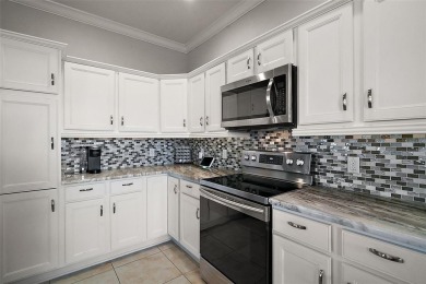 MAGNIFICENT 3/2 Camden TURNKEY with ENCLOSED UNDER-AIR LANAI and on The Links of Spruce Creek in Florida - for sale on GolfHomes.com, golf home, golf lot
