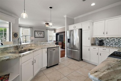 MAGNIFICENT 3/2 Camden TURNKEY with ENCLOSED UNDER-AIR LANAI and on The Links of Spruce Creek in Florida - for sale on GolfHomes.com, golf home, golf lot