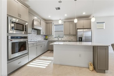 This spacious 2-bedroom/2 bathroom/versatile den Prosperity on Panther Run Golf Club in Florida - for sale on GolfHomes.com, golf home, golf lot