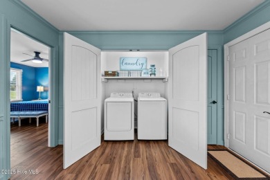 Welcome to this beautiful 3-bedroom, 2-bath home nestled in the on Harbour Point Golf Club in North Carolina - for sale on GolfHomes.com, golf home, golf lot