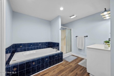 Welcome to this beautiful 3-bedroom, 2-bath home nestled in the on Harbour Point Golf Club in North Carolina - for sale on GolfHomes.com, golf home, golf lot