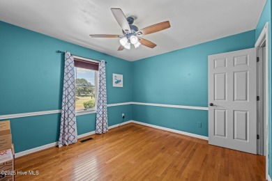 Welcome to this beautiful 3-bedroom, 2-bath home nestled in the on Harbour Point Golf Club in North Carolina - for sale on GolfHomes.com, golf home, golf lot