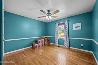 Welcome to this beautiful 3-bedroom, 2-bath home nestled in the on Harbour Point Golf Club in North Carolina - for sale on GolfHomes.com, golf home, golf lot