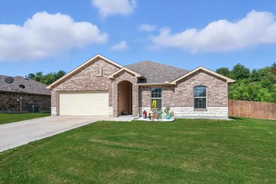 Welcome to your lakeside retreat! Nestled in the heart of on The Club At Runaway Bay in Texas - for sale on GolfHomes.com, golf home, golf lot