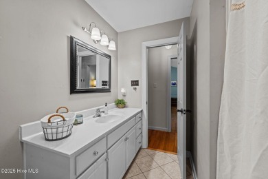 Welcome to this beautiful 3-bedroom, 2-bath home nestled in the on Harbour Point Golf Club in North Carolina - for sale on GolfHomes.com, golf home, golf lot