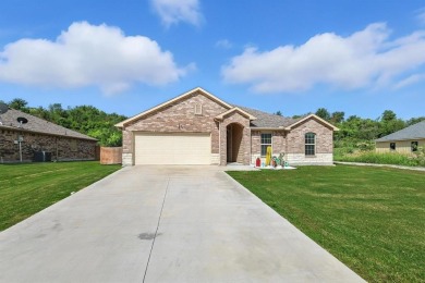 Welcome to your lakeside retreat! Nestled in the heart of on The Club At Runaway Bay in Texas - for sale on GolfHomes.com, golf home, golf lot