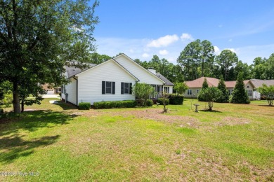 Welcome to this beautiful 3-bedroom, 2-bath home nestled in the on Harbour Point Golf Club in North Carolina - for sale on GolfHomes.com, golf home, golf lot